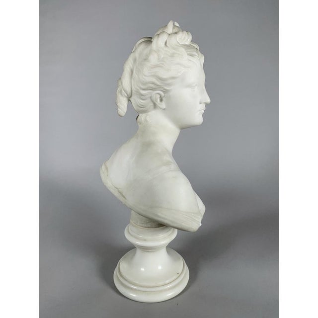White marble sculpture depicting a bust of Diana after Jean-Antoine Houdon (1741-1828) French work from the 19th century...