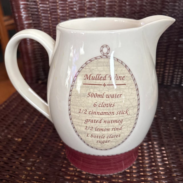 Wedgwood Sarah's Garden Queensware Pitcher circa 1997. This pitcher has a basket of holly on the front. There's a recipe...