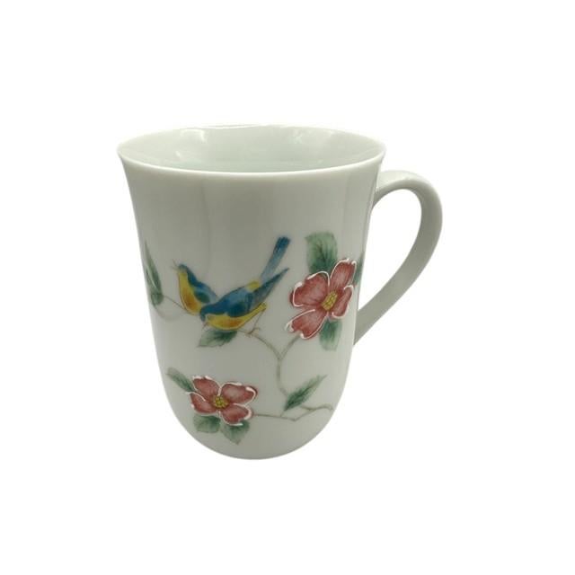 This is a beautiful set of two vintage Otagiri coffee mugs! Crafted in Japan, these delicate white ceramic mugs feature a...