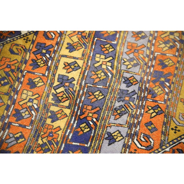 Introducing a one-of-a-kind vintage Turkish handmade wool rug, a masterpiece crafted by skilled artisans using traditional...