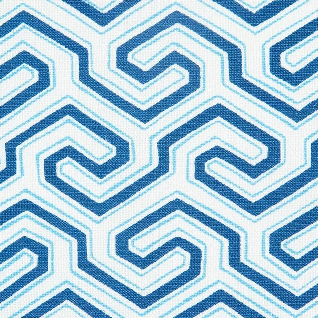 Rendered by hand, this elegant, two-color fretwork design has softened edges and an unexpected, artisanal quality. Also...