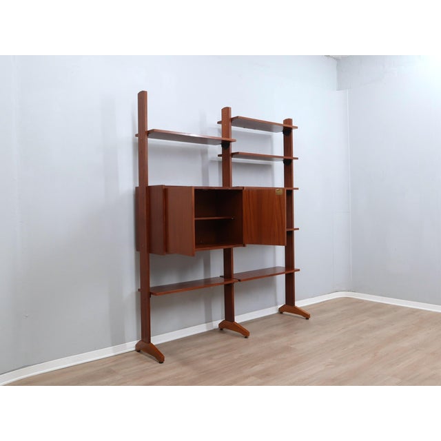 Teak Modular Wall Unit with Drop-Front Bar, 1950s, in Restored conditions. Designed 1950 to 1959