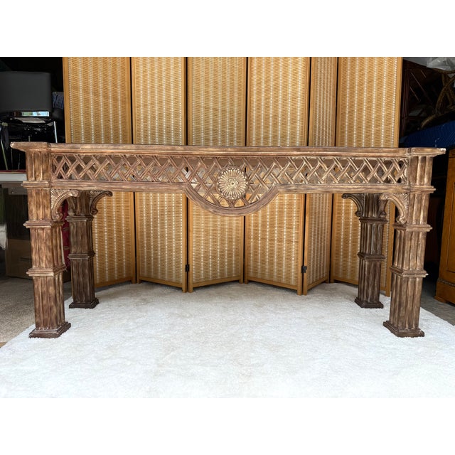A beautifully distinctive vintage console table acquired from a private estate, featuring a natural fossil stone inset...