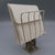 A vintage brass letter rack with a wire frame and an ornate cast pedestal base featuring scrollwork and rope twist...