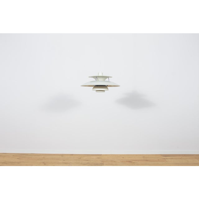 The ph 5 pendant lamp was designed by poul henningsen for the renowned danish manufacturer louis poulsen. Introduced in...