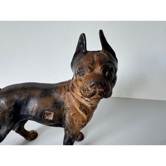 Exceptional antique cast iron Boston Terrier doorstop dating to the late 19th century. This charming and highly...