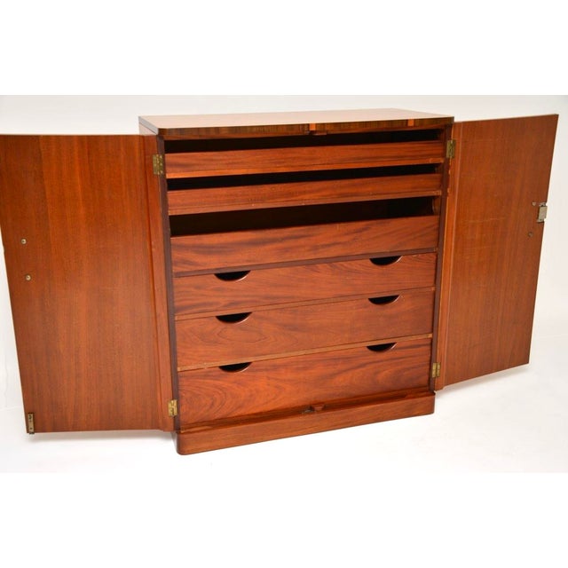 A spectacular original Art Deco birds eye maple and walnut compactum wardrobe. This was made in England, it dates from the...