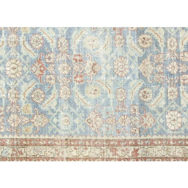 1940s Persian Melayer Rug. Hand woven with wool on cotton foundation in the Hamadan region of Iran. The Persian carpet is...