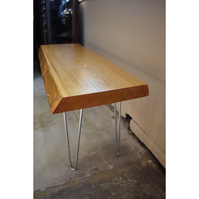 Beautiful Solid Live Edge, Wood Slab Bench Natural Wood Finish with Metal Legs Dims: 18"h x 43"w x 15 1/4"d Condition:...