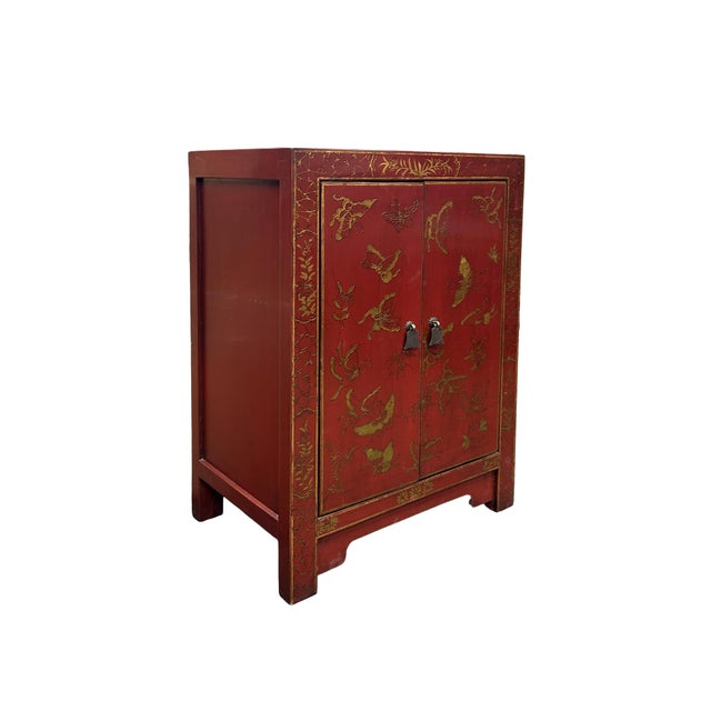 Elevate your interior space with this exquisite vintage-style red lacquered cabinet, a masterclass in traditional East...
