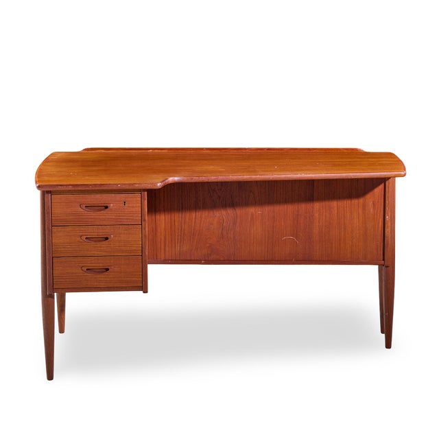 Göran Strand Mid Century Swedish Teak Boomerang Desk This desk measures: 54 wide x 32 deep x 28.5 high, with a chair...