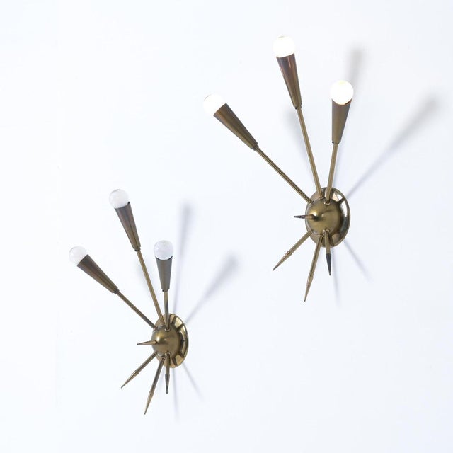 These stunning sputnik wall lights were designed and manufactured in Italy. Each light is made of brass, with 3 arms with...