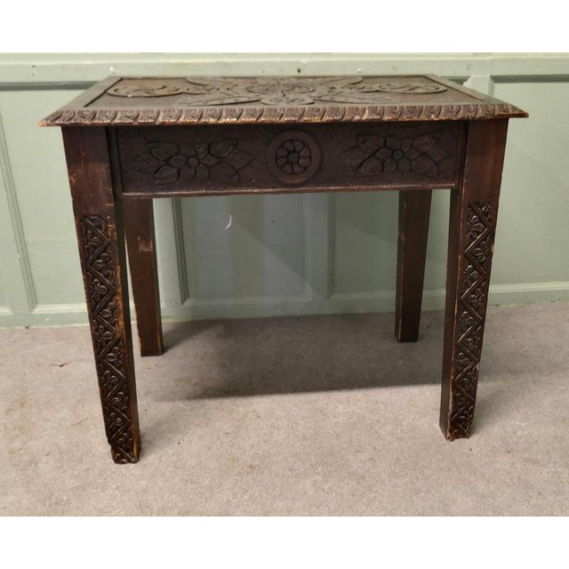 Gothic Style Carved Oak Side Table This is a good solid table, the top is thick and it has a carved pattern on the top,...