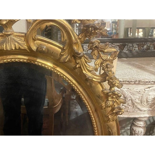 Wood 19th C. French Ornately Carved Giltwood Oval Mirror For Sale - Image 7 of 7