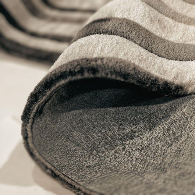 Sapien Rug is a modern organic rug that explores the depth of human artistic evolution. The fragmented lines create a...