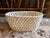 Charming vintage Spanish ceramic basket featuring an intricate open-weave lattice design that beautifully mimics...