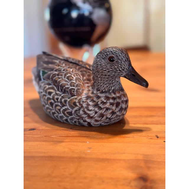 Authentic vintage hand-carved wooden duck decoy sculpture, signed and dated 1976 or 96 on the underside beneath a burned...