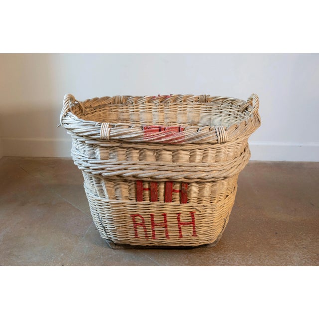 A rare and beautifully preserved French Champagne harvesting basket dating to the 1940s, hailing from the legendary...