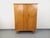 Vintage 1960s wardrobe in oak with geometric marquetry, splayed legs, ample storage: two doors with two handles and brass...