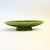A mid century pottery bowl. Long oval shape on a pedestal base with a beautiful green drip glaze. Measures 14.25"W x 4.5"D...