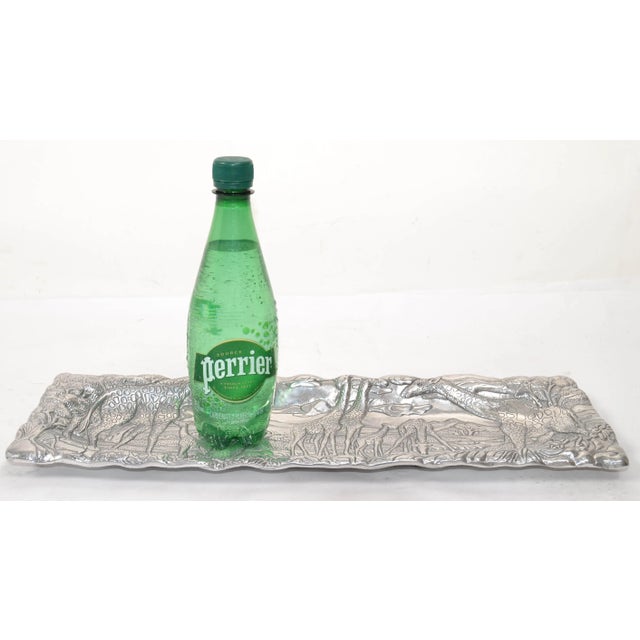 The 1992 marked by Arthur Court Rectangular Safari Giraffe Platter, Serving Tray, Barware is made of sand cast aluminum....