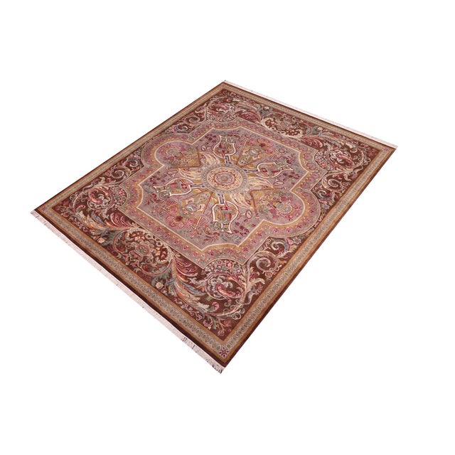 Designed with mesmerizing intricacy and gorgeous color palette, this hand-knotted masterpiece demonstrates the beauty and...