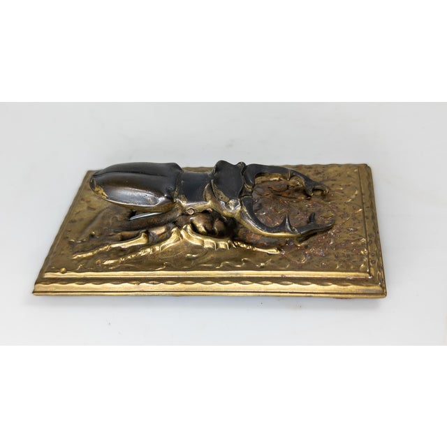 We are selling this great paper clip in the form of a stag horn beetle. The beetle appears to be cast bronze or copper on...