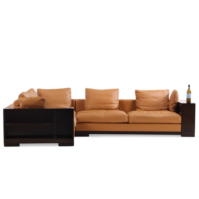 Contemporary leather sectional sofa hand-made in France by high-end customer furniture maker, Hugues Chevalier. This is...