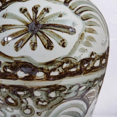 The Brown Silla Flower Porcelain Temple Jar Lamp by Legend of Asia features a beautiful hand painted flower design on...