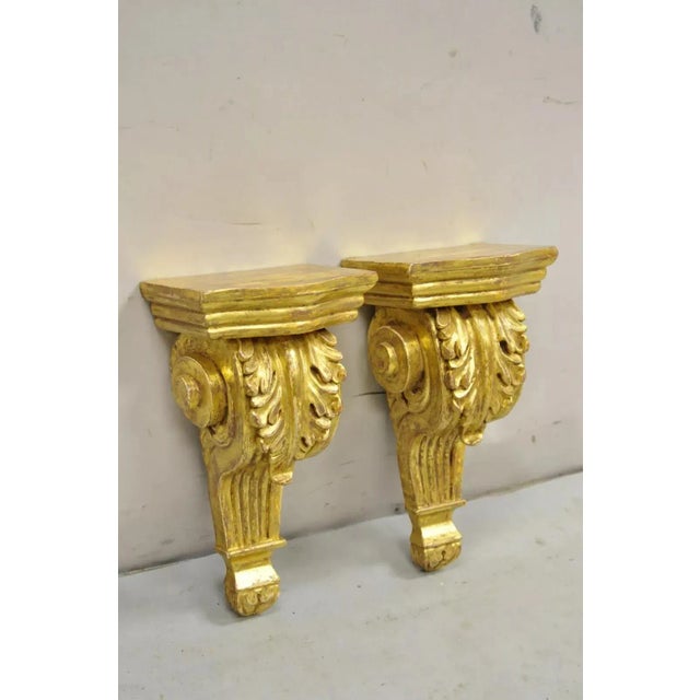 Gold Giltwood French Louis XV Style Wood Acanthus Corbel Small Wall Shelf - Pair. Circa Mid 20th Century. Measurements:...