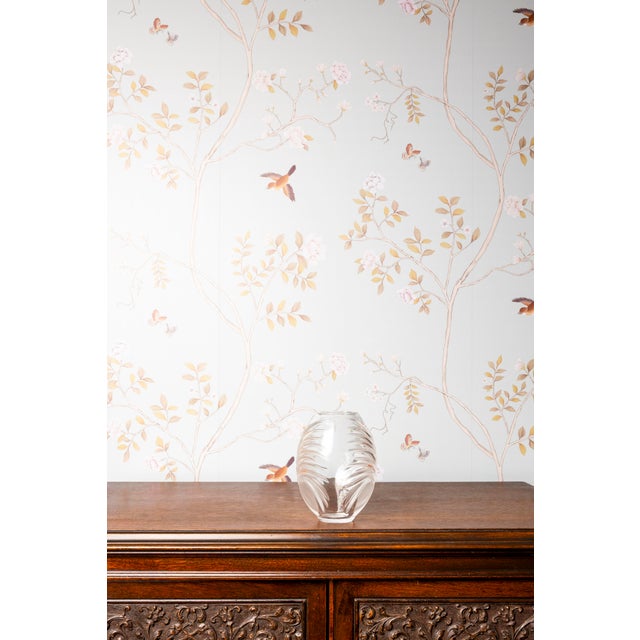 This Lalique bud vase has a subtle orange dot along the ridges of the plant etched into the glass. Good condition, vintage...