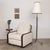 Stunning vintage Art Deco club chair from France. Beautiful sculptural wood frame with angled detail. Newly upholstered in...