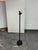 Design Plus Gallery presents a Black floor lamp from OTT-LITE. This Vision Saver model has a slender black post, an...