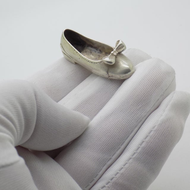 This charming miniature shoe was handcrafted in Italy during the 1950s/1960s, reflecting the elegance and precision of...