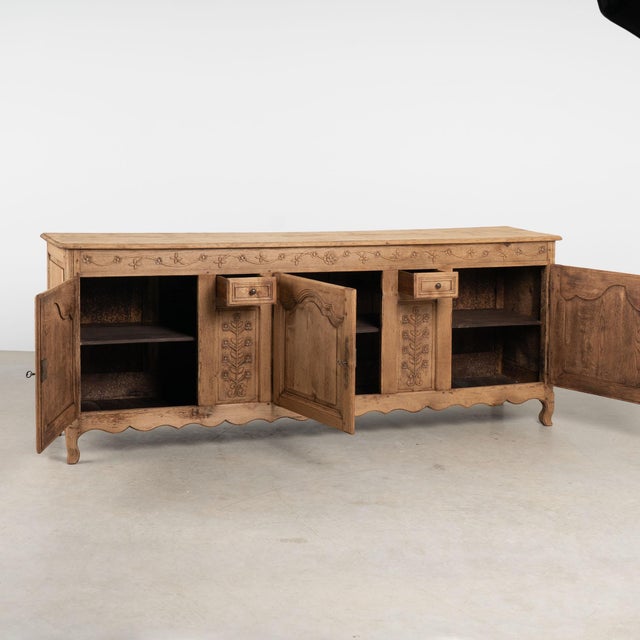 This French sideboard is crafted in oak and offers a traditional French country look in an impressive scale measuring over...