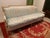 Here we have a gorgeous vintage French Louis XVI style sofa or three person settee. I don't know the exact age, but this...