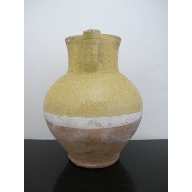 Wonderful antique French la cruche or water pitcher. Large pitcher with handle, measures 9 1/2" tall x 7" x 6 1/2"....