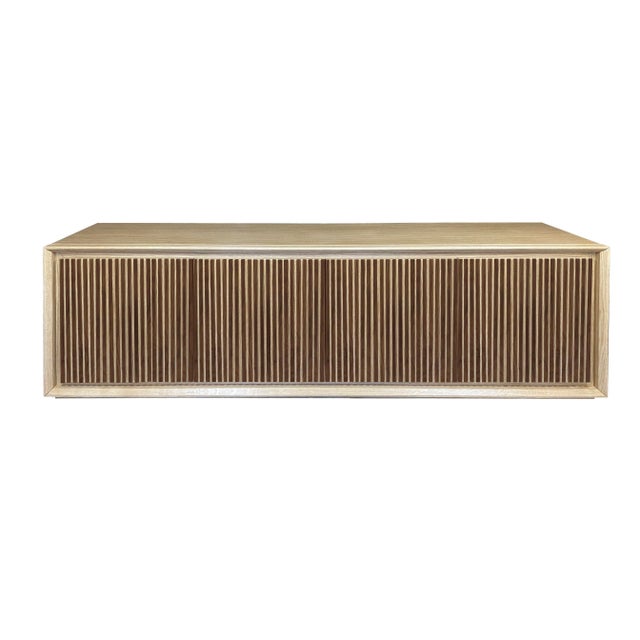 Credenza "Escape Noce Due" by Mascia Meccani for Meccani Design, 2022. 4 -doors in oak in oak and channel walnut with two...