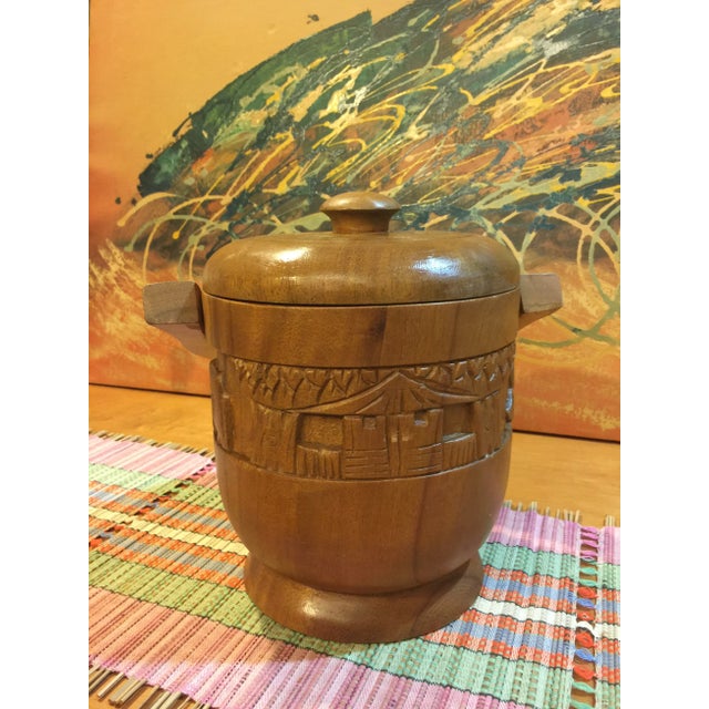 A great vintage accent piece for your wine/liquor bar. Ice bucket with a primitive hand carved scene. Probably teak wood,...