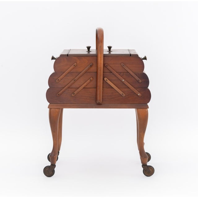Art Deco Walnut Sewing Box, early 20th century, two top compartments opening accordion-style to three additional...