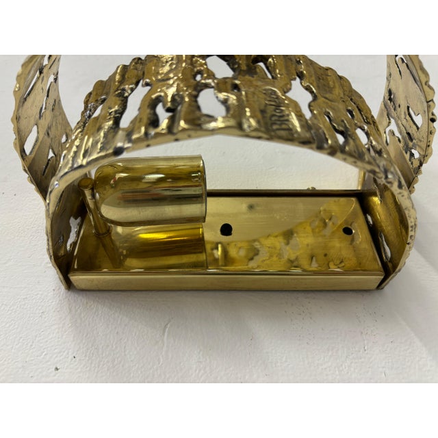 Angelo Brotto Cast Brutalist Brass Wall Sconce. His name is part of the design, carved and molded right into the fixture....