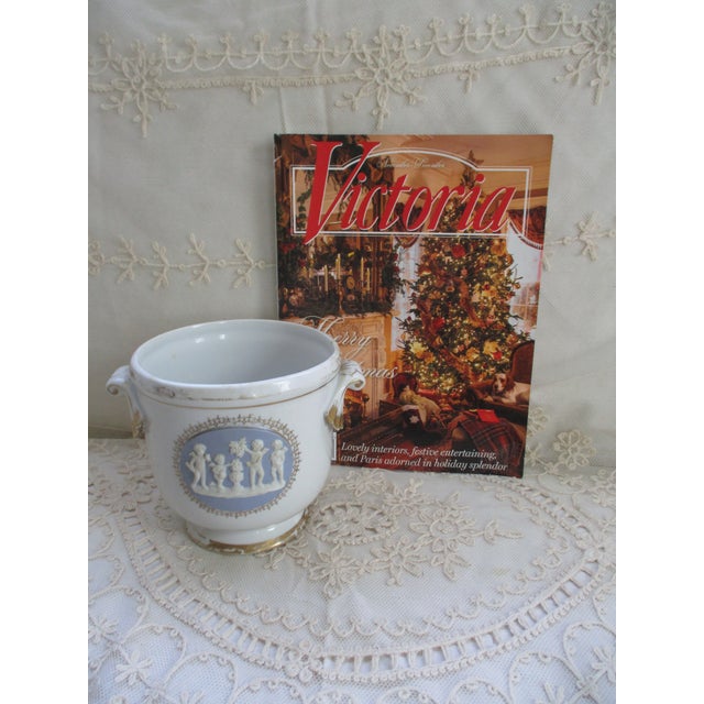 This is a Gorgeous! Antique White and Gold Porcelain Cache Pot with a Light Blue Jasperware Plaque with Cherubs and has...