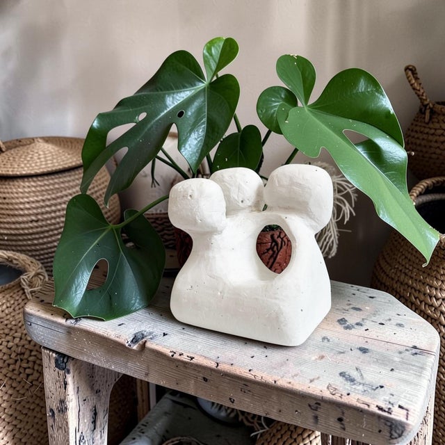 This Carved White Chalk Modern Sculpture is a stunning addition to any contemporary space, expertly crafted to blend...