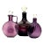 Amethyst Glass Bottle Curation - Group of 3 For Sale