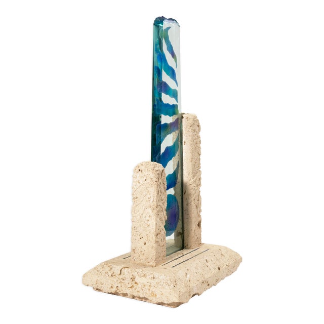 A striking mixed-media sculpture by Damian Priour exemplifies postmodern experimentation through the interplay of...