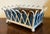 1930's white painted zinc X-form basketweave cachepot planter or jardiniere with blue tole liner on ball feet. Measures 12...