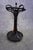 A rare original Thonet umbrella stand, painted in a rich, deep black. Subtle patina throughout reveals hints of the...