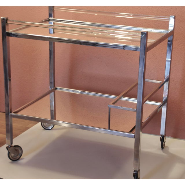 This modernist bar car was designed by Art Deco designer Jacques Adnet (1901-1984) in France in the 1930s. Typical of...