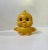Adorable mechanical musical Sankyo lullaby duckling in molded yellow plastic. Eye and wing movement when playing. Dated...