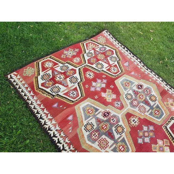 This is a vintage handwoven Turkish kilim rug. Handwoven with high quality pure wool.